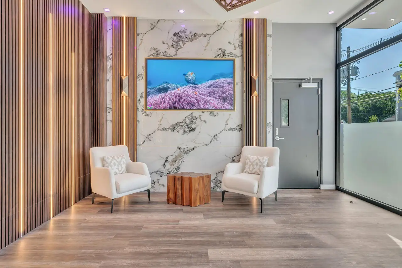 Lobby seating area with wall-mounted TV